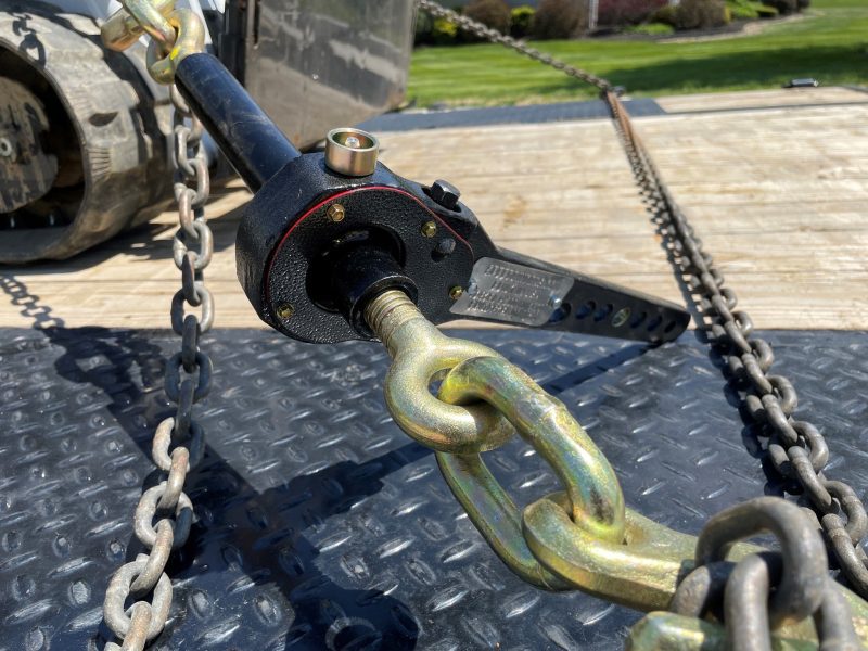 Speedbinders torque drive load binder attached to skid steer 9200 lb