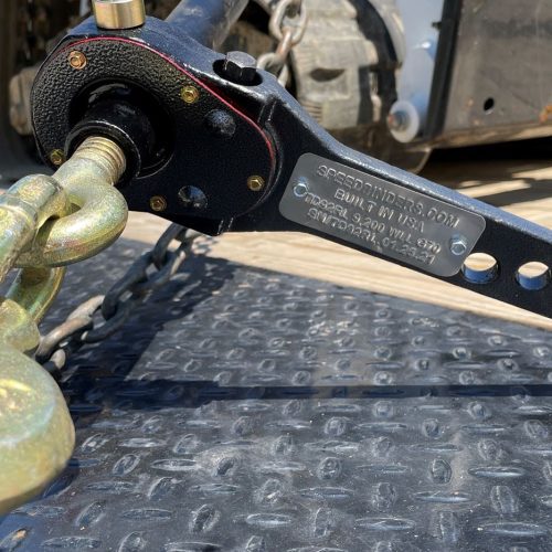 Speedbinders torque drive load binder attached to skid steer closeup 13000 lb